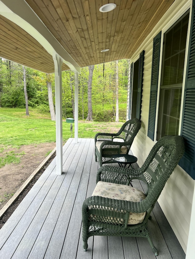 239 Cider Hill Rd, York, ME 03909 - wooden porch featuring a yard