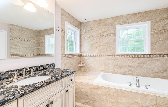 239 Cider Hill Rd, York, ME 03909 - bathroom featuring a garden tub, vanity, and tiled shower