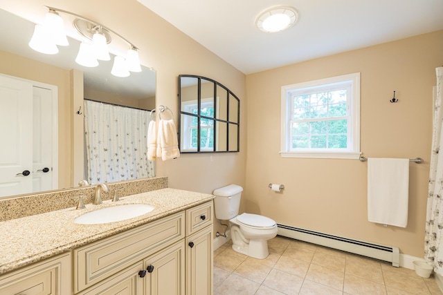 239 Cider Hill Rd, York, ME 03909 - bathroom featuring a baseboard radiator, healthy amount of natural light, toilet, and tile patterned floors