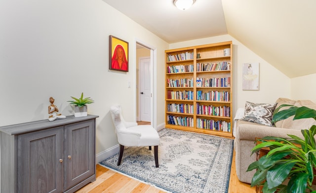 239 Cider Hill Rd, York, ME 03909 - sitting room with vaulted ceiling, wood finished floors, and baseboards