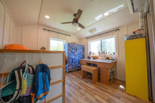 486 Main St, Orono, ME 04473 - kitchen with light wood finished floors, ceiling fan, recessed lighting, lofted ceiling, and a decorative wall