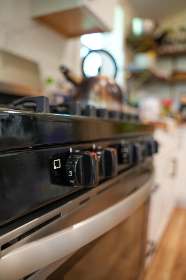 486 Main St, Orono, ME 04473 - kitchen view of stainless steel gas stove