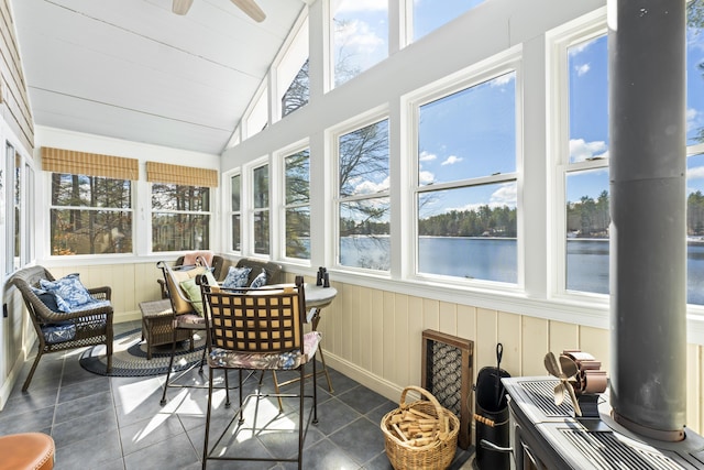 159 Loop Rd, Acton, ME 04001 - sunroom with tile patterned flooring, lofted ceiling, and a water view