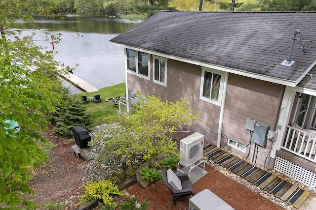 159 Loop Rd, Acton, ME 04001 - view of property exterior with a water view, roof with shingles, and a cooling unit