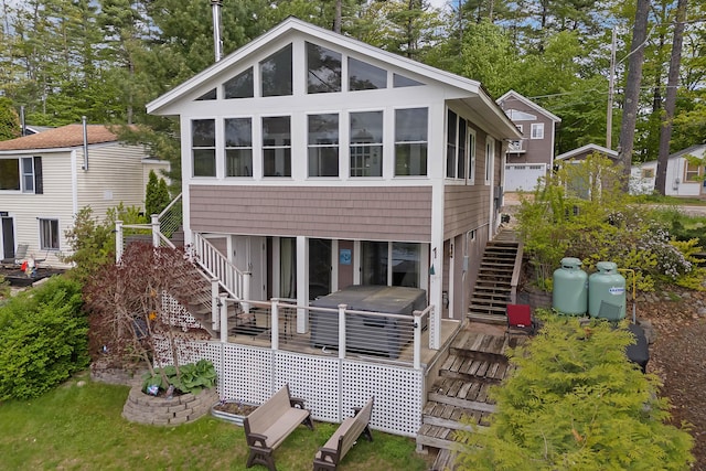 159 Loop Rd, Acton, ME 04001 - back of property featuring stairs, a sunroom, and view of wooded area