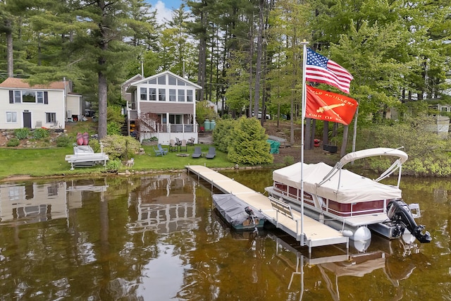 159 Loop Rd, Acton, ME 04001 - dock featuring a water view, view of wooded area, a yard, and stairway