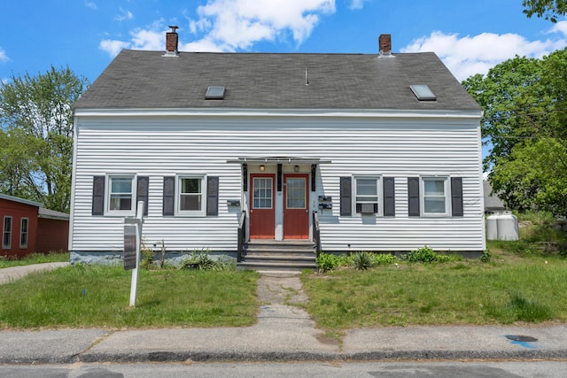 138 Summer St, Biddeford, ME 04005 - view of front of house with entry steps and a chimney