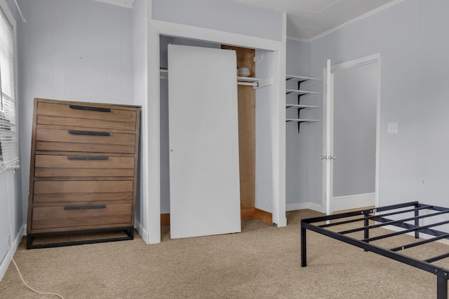 138 Summer St, Biddeford, ME 04005 - bedroom with carpet floors, a closet, ornamental molding, and baseboards