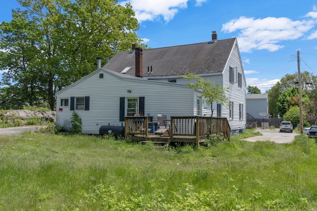 138 Summer St, Biddeford, ME 04005 - back of house with a chimney and a deck