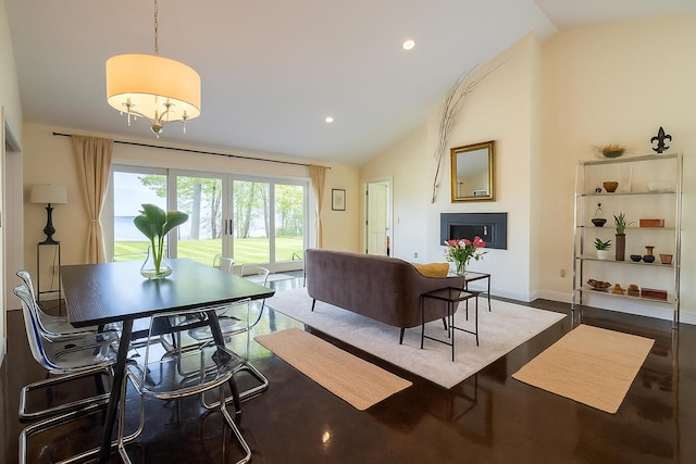 1496 Atlantic Hwy, Northport, ME 04849 - living area with vaulted ceiling, a fireplace, recessed lighting, and baseboards