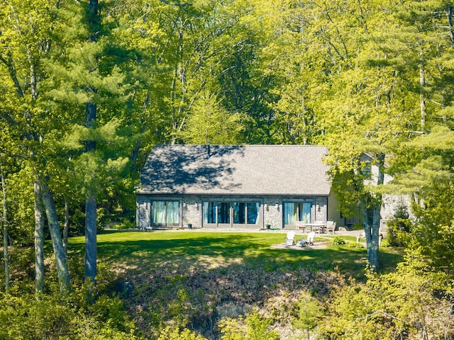 1496 Atlantic Hwy, Northport, ME 04849 - view of front of property with a patio area and a front lawn