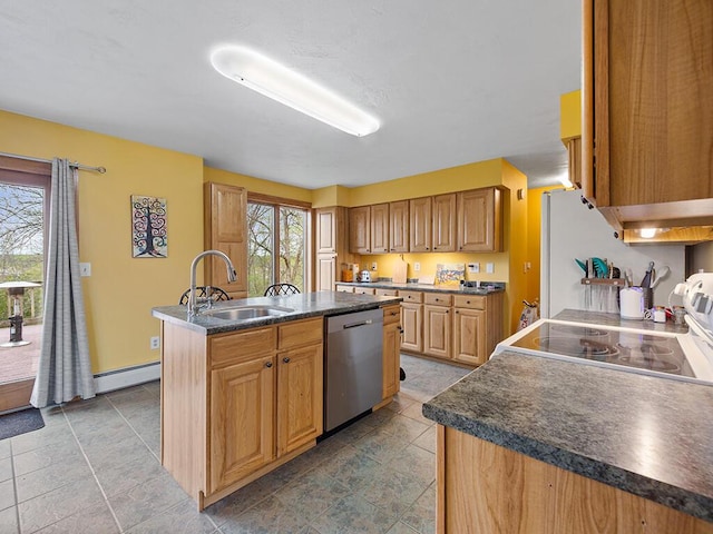 19 Falls Rd, Benton, ME 04901 - kitchen featuring dishwasher, a sink, a center island with sink, baseboard heating, and dark countertops