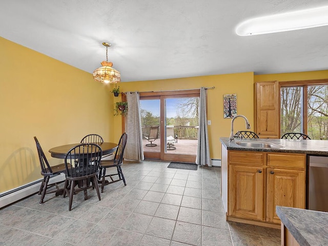 19 Falls Rd, Benton, ME 04901 - dining space with plenty of natural light, baseboards, light tile patterned floors, and baseboard heating