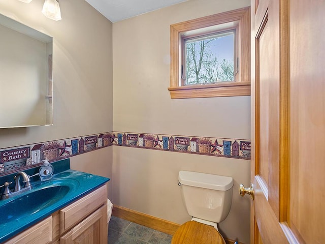 19 Falls Rd, Benton, ME 04901 - half bathroom featuring toilet, baseboards, vanity, and tile patterned floors