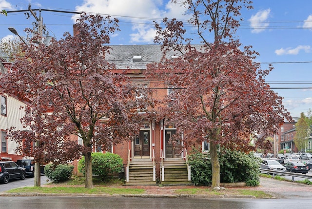450 Cumberland Ave, Portland, ME 04101 - townhome / multi-family property with a high end roof and brick siding