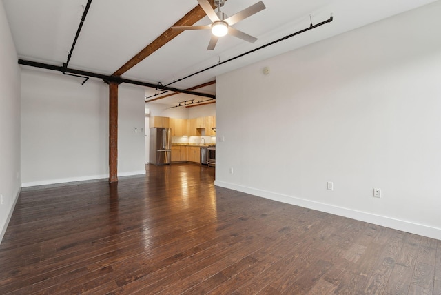 2 Main St Unit 35-203, Biddeford, ME 04005 - unfurnished living room with dark wood finished floors, ceiling fan, and baseboards