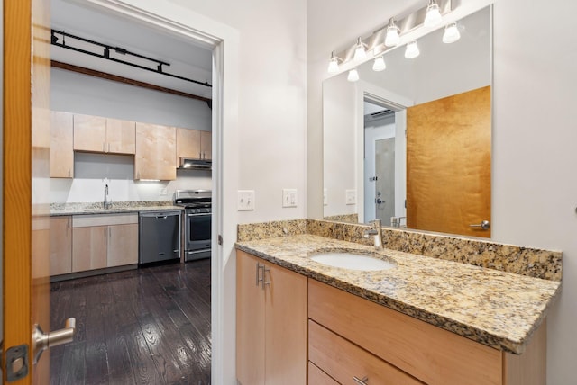 2 Main St Unit 35-203, Biddeford, ME 04005 - bathroom featuring vanity and wood-type flooring