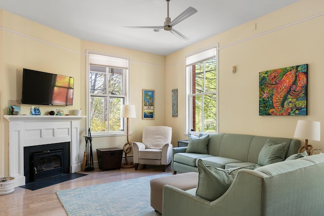 28 Ingalls Rd Unit 28, Portland, ME 04109 - living area with ceiling fan, plenty of natural light, and wood finished floors