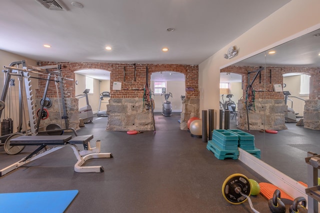 28 Ingalls Rd Unit 28, Portland, ME 04109 - gym with arched walkways, brick wall, and recessed lighting