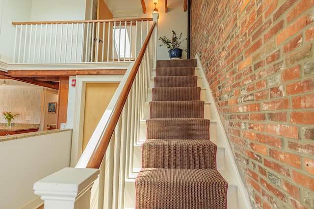 32 Pleasant St Unit 3, Portland, ME 04101 - stairs with brick wall