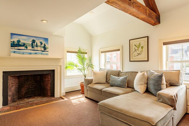 32 Pleasant St Unit 3, Portland, ME 04101 - living area featuring carpet flooring, vaulted ceiling, a fireplace with flush hearth, and recessed lighting