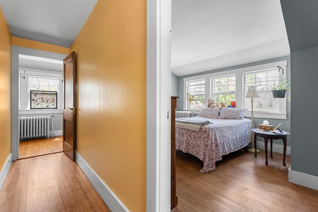 103 Green St, Augusta, ME 04330 - bedroom featuring radiator heating unit, hardwood / wood-style flooring, and baseboards