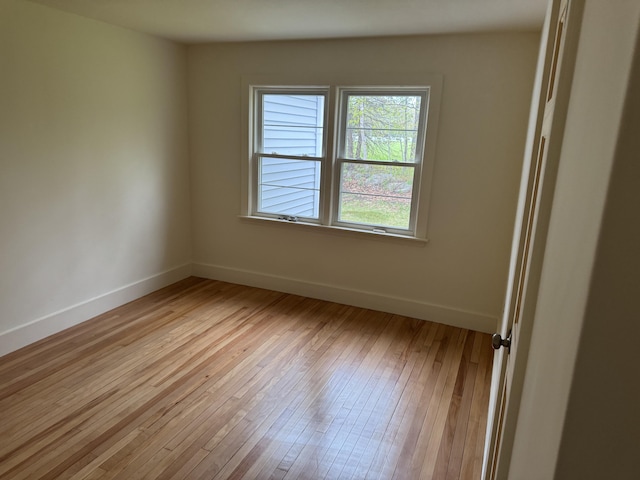 24 Chapel St, Boothbay, ME 04537 - spare room with hardwood / wood-style floors and baseboards