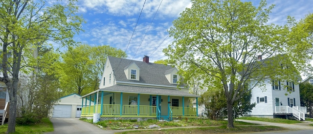 128 Fern St, Bangor, ME 04401 - view of front of property with a porch, an outbuilding, a detached garage, a shingled roof, and a chimney