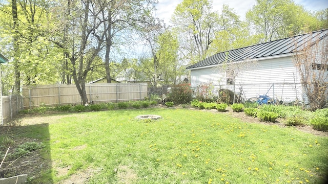 128 Fern St, Bangor, ME 04401 - view of yard featuring an outdoor fire pit