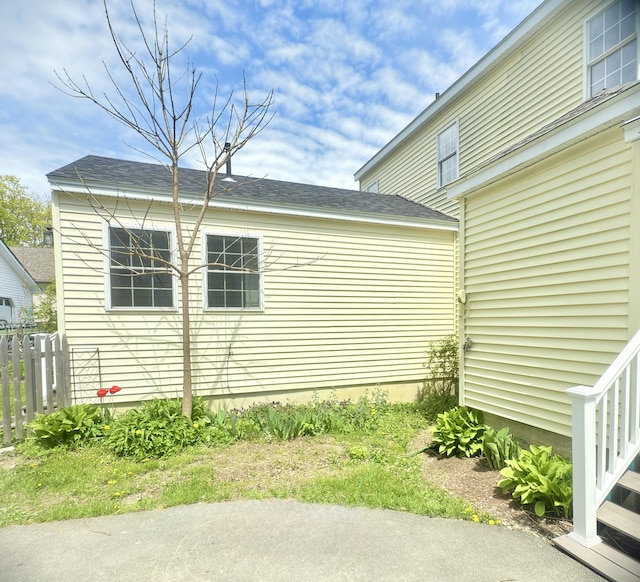 128 Fern St, Bangor, ME 04401 - view of home's exterior featuring fence