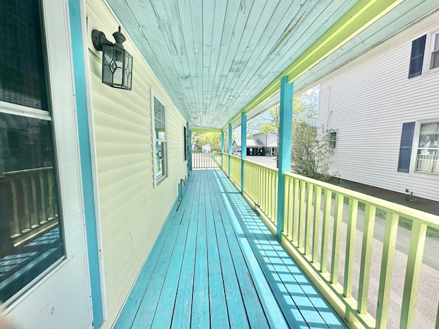 128 Fern St, Bangor, ME 04401 - wooden terrace featuring a porch
