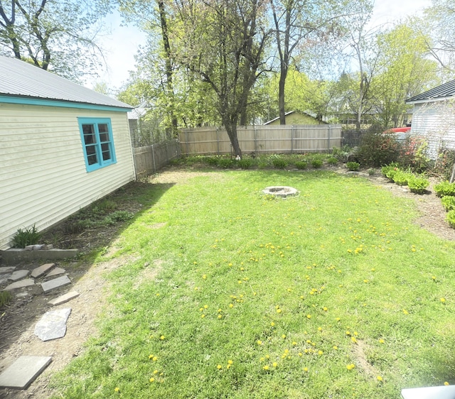 128 Fern St, Bangor, ME 04401 - view of yard featuring an outdoor fire pit