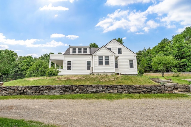 661 Veterans Hwy, Brooks, ME 04921 - back of property with a metal roof