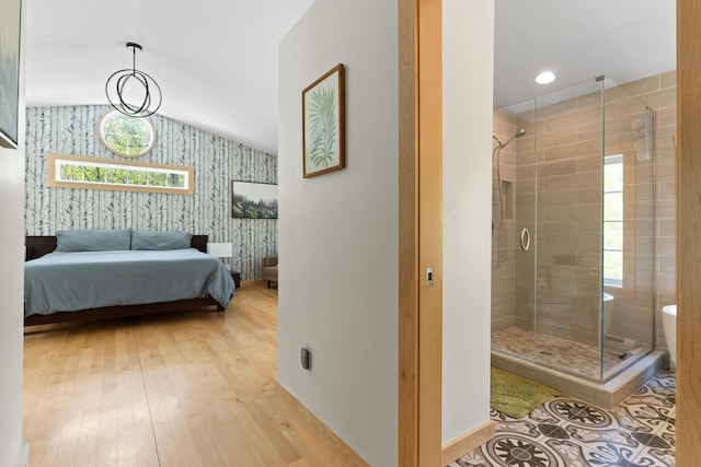 64 Old Kings Hwy, Ogunquit, ME 03907 - bedroom with wallpapered walls, wood finished floors, lofted ceiling, and baseboards