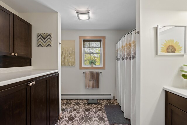 64 Old Kings Hwy, Ogunquit, ME 03907 - bathroom with a baseboard radiator, vanity, and a shower with shower curtain