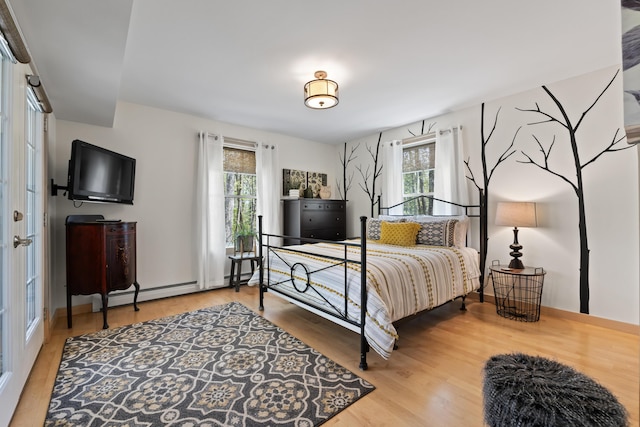 64 Old Kings Hwy, Ogunquit, ME 03907 - bedroom featuring multiple windows and wood finished floors