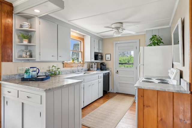 13 Atlantic Cir, Kennebunk, ME 04043 - kitchen featuring white appliances, a sink, open shelves, a ceiling fan, and light wood-style flooring