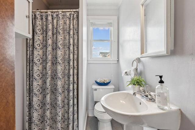 13 Atlantic Cir, Kennebunk, ME 04043 - bathroom featuring toilet, crown molding, and a shower with shower curtain