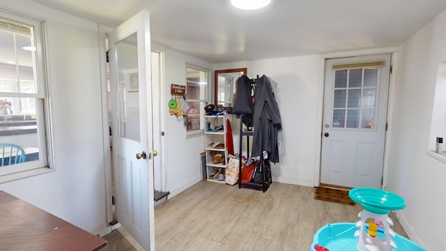 37 Enfield Rd, Lincoln, ME 04457 - foyer entrance with wood finished floors and baseboards