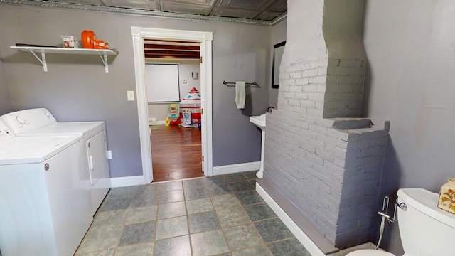 37 Enfield Rd, Lincoln, ME 04457 - washroom featuring washer and clothes dryer and baseboards