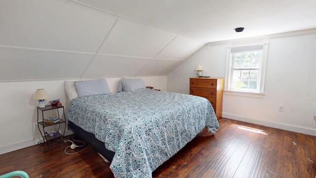 37 Enfield Rd, Lincoln, ME 04457 - bedroom with hardwood / wood-style flooring, baseboards, and lofted ceiling