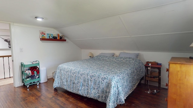 37 Enfield Rd, Lincoln, ME 04457 - bedroom featuring wood finished floors and lofted ceiling