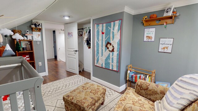 37 Enfield Rd, Lincoln, ME 04457 - bedroom featuring wood finished floors, baseboards, and vaulted ceiling