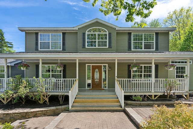 17 S Rd, Winthrop, ME 04364 - country-style home featuring a porch