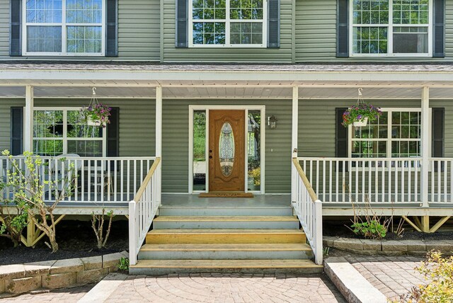 17 S Rd, Winthrop, ME 04364 - doorway to property featuring covered porch