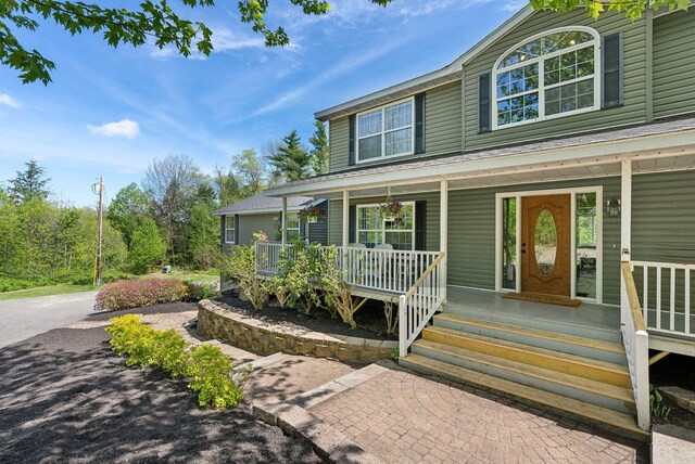 17 S Rd, Winthrop, ME 04364 - view of front facade featuring a porch