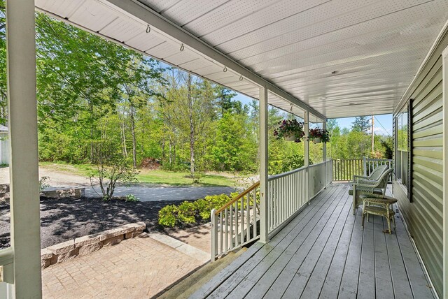 17 S Rd, Winthrop, ME 04364 - wooden terrace featuring a porch