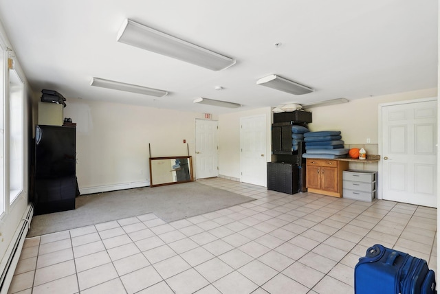 17 S Rd, Winthrop, ME 04364 - garage featuring a baseboard heating unit