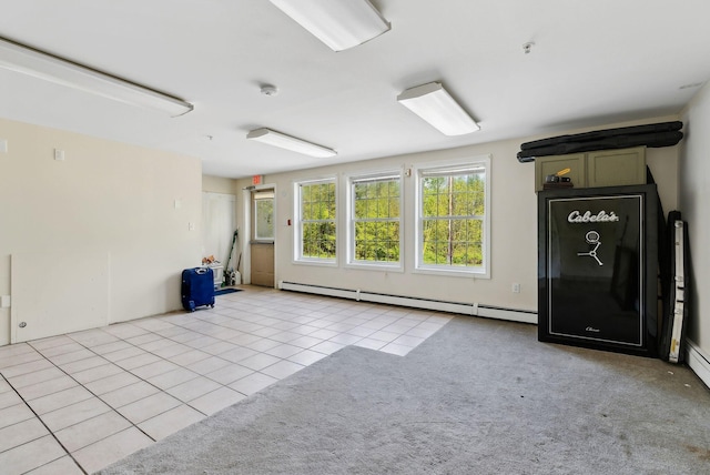 17 S Rd, Winthrop, ME 04364 - spare room with tile patterned flooring, a baseboard heating unit, a smoke detector, a pendent fire sprinkler, and carpet flooring
