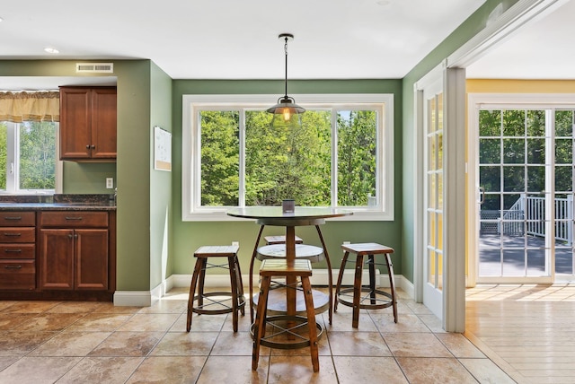 17 S Rd, Winthrop, ME 04364 - dining area featuring baseboards and plenty of natural light
